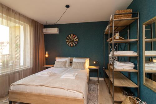 Posteľ alebo postele v izbe v ubytovaní Heart of Sofia Studio
