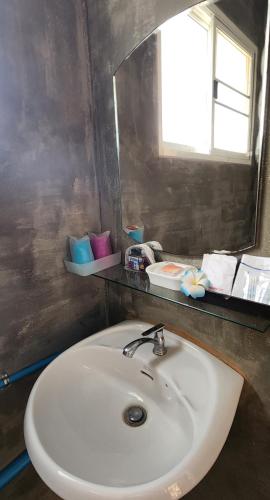 Koupelna v ubytování Rimtharnn Homestay Maewin
