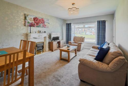 a living room with a couch and a table at Host & Stay - White Rose in Marske-by-the-Sea