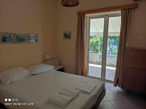 Krevet ili kreveti u jedinici u objektu Seaside villa in Eretria
