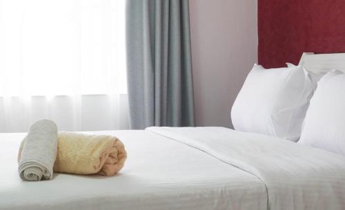A bed or beds in a room at Delta sharm resort