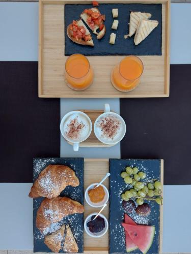 a collage of pictures of different types of food at Le Vie Del Centro Luxury Room in Matera
