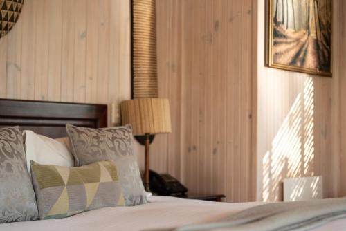 Ένα ή περισσότερα κρεβάτια σε δωμάτιο στο Prana Lodge