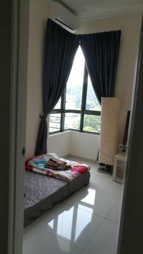 Säng eller sängar i ett rum på Comfortable Abode for Stay in Kuala Lumpur!