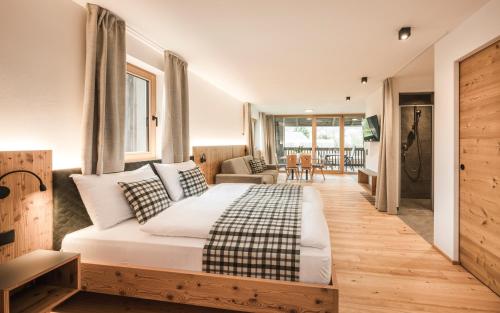 Posteľ alebo postele v izbe v ubytovaní Hotel Lener