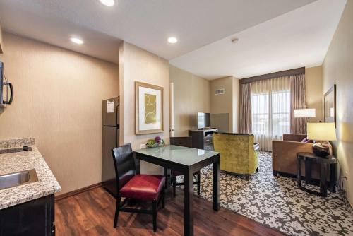 a room with a table and a kitchen and a living room at Homewood Suites by Hilton Oxnard/Camarillo in Oxnard