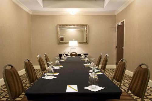 a conference room with a long table and chairs at Hilton Garden Inn Cartersville in Cartersville