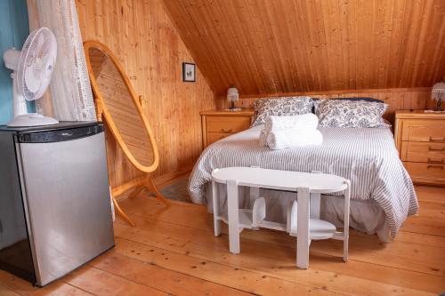 Ένα ή περισσότερα κρεβάτια σε δωμάτιο στο Bed & café Petit Papillon