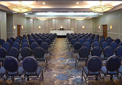 a conference room with chairs and a table in the background at DoubleTree by Hilton Murfreesboro in Murfreesboro