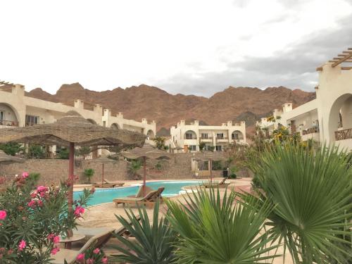 Bazén v ubytování Sea View -SunnyDahab Resort nebo v jeho okolí