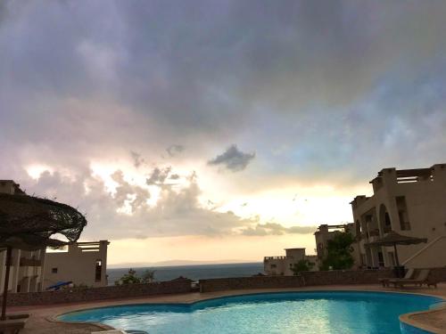 Bazén v ubytování Sea View -SunnyDahab Resort nebo v jeho okolí