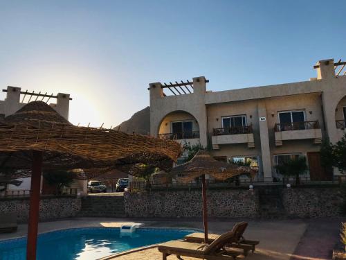 Bazén v ubytování Sea View -SunnyDahab Resort nebo v jeho okolí