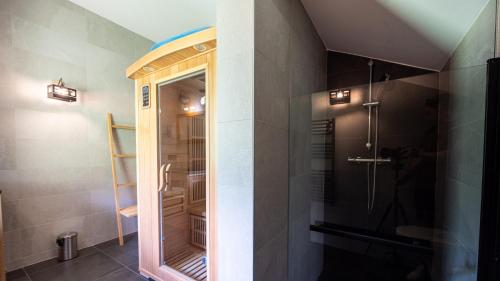 a bathroom with a shower with a glass door at Les Aiguilles 201 - sublime Appt - 7 pers in Saint-Sorlin-dʼArves