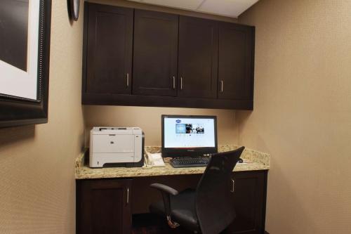 a computer sitting on a desk in a room at Hampton Inn & Suites Port St. Lucie in Port Saint Lucie