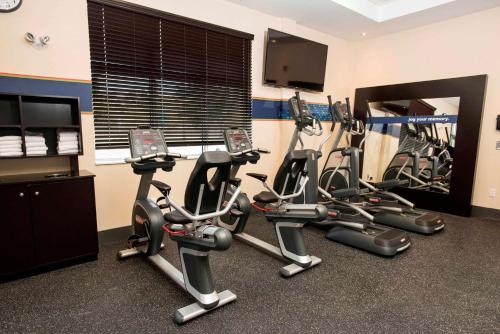a gym with several exercise bikes in a room at Hampton Inn & Suites by Hilton Thunder Bay in Thunder Bay
