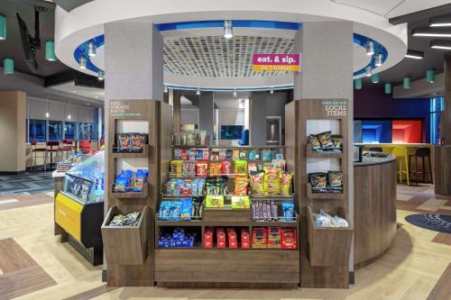 a store with a display of food and drinks at Tru By Hilton Cleveland Midtown in Cleveland
