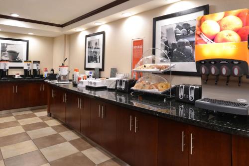 a breakfast counter in a hotel room with a laptop at Hampton Inn Alpine in Alpine