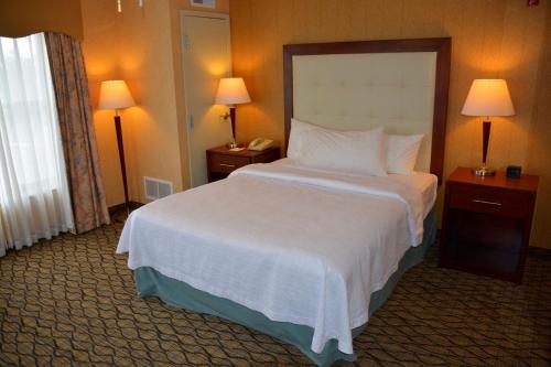 Ένα ή περισσότερα κρεβάτια σε δωμάτιο στο Homewood Suites by Hilton Brighton