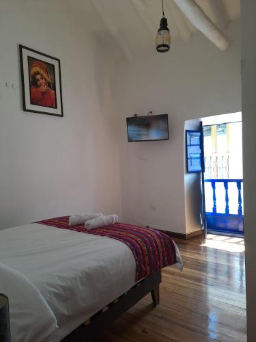 Postel nebo postele na pokoji v ubytování CASA HUAYNA HOUSE VITOQuE
