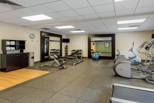 a gym with treadmills and chairs in a room at Hampton Inn & Suites Arcata in Arcata