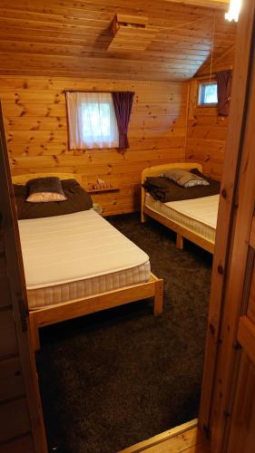 Postel nebo postele na pokoji v ubytování 城ケ崎海岸つり橋の家