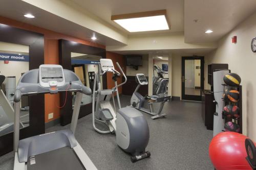a gym with treadmills and machines in a room at Hampton Inn Las Vegas/Summerlin in Las Vegas