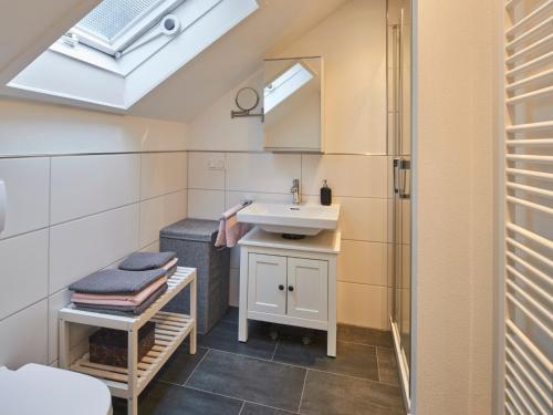 a bathroom with a sink and a shower at Ferienwohnungen Brigitte in Bad Reichenhall