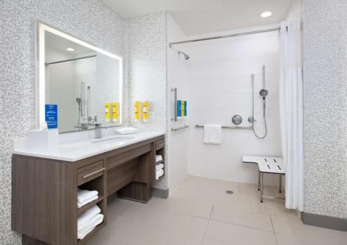 a bathroom with a sink and a shower at Home2 Suites By Hilton Wichita Falls, Tx in Wichita Falls