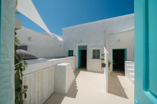 a view of a house with a patio at Marla Luxury Residences in Megalokhori