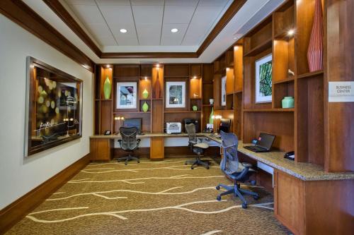 an office with desks and chairs in a room at Hilton Garden Inn Durham-University Medical Center in Durham