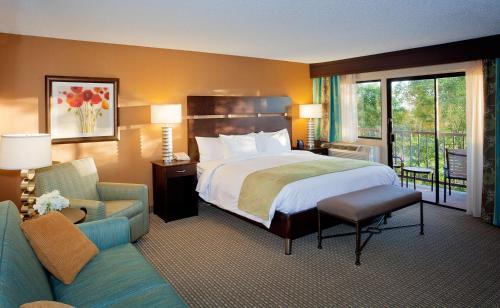 A bed or beds in a room at DoubleTree by Hilton Santa Fe