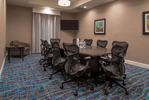 a conference room with a table and chairs at Hampton Inn Benson in Benson