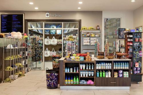 a store front of a store with a lot of products at Hilton Garden Inn South Padre Island Beachfront in South Padre Island
