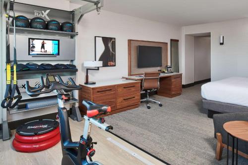 a hotel room with a bike in a room at Doubletree By Hilton Fullerton in Fullerton