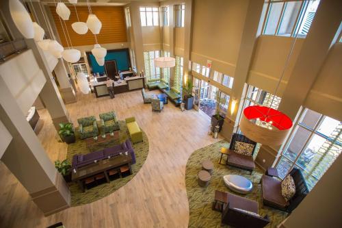 an overhead view of a living room with furniture at Hilton Garden Inn Montebello / Los Angeles in Montebello