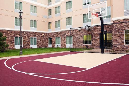 a basketball court in front of a building at Homewood Suites Saint Cloud in Saint Cloud