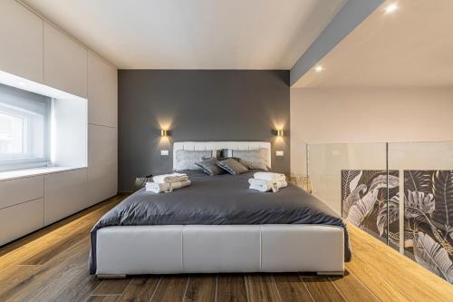 Postel nebo postele na pokoji v ubytování Domo Loft