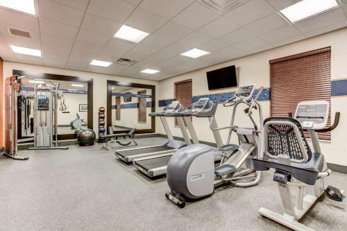 a gym with treadmills and machines in a room at Hampton Inn & Suites Manchester, TN in Manchester