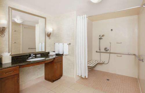 a bathroom with a sink and a shower at Homewood Suites by Hilton Sacramento Airport-Natomas in Sacramento
