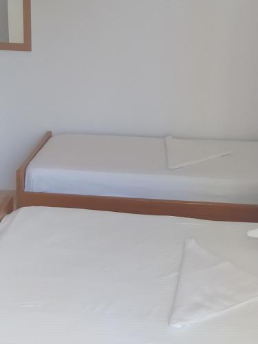 Postel nebo postele na pokoji v ubytování Hotel Chicago