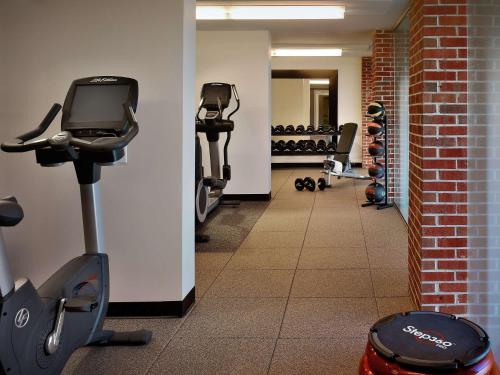 a gym with treadmills and cardio equipment in a room at DoubleTree Hotel & Suites Charleston Airport in Charleston