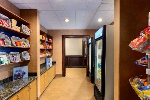 a hallway of a store with a refrigerator at Hampton Inn & Suites Pharr in Pharr