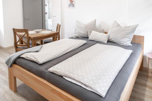 Postel nebo postele na pokoji v ubytování Samoobslužné Apartmány Evičenstvo