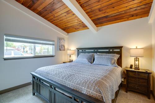 a bedroom with a bed with a wooden ceiling at Birch Bay Vacation Home, Close to Beachfront Parks in Blaine