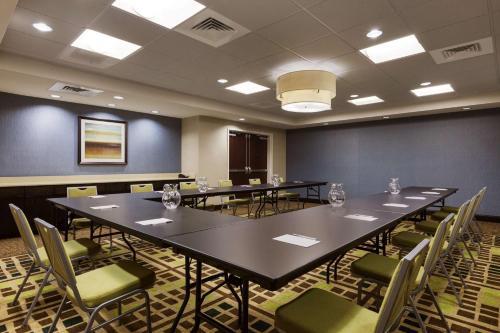 a conference room with a large table and chairs at Hampton Inn and Suites Camp Springs in Camp Springs