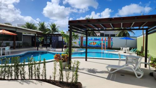 卡博迪聖阿戈斯蒂尼奧的住宿－恩賽達德茲克萊斯酒店，度假村的游泳池