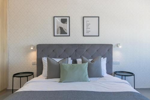 Llit o llits en una habitació de Phaedrus Living: Plateia Suite Verde