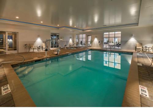 a large swimming pool in a hotel room at Hampton Inn & Suites - Reno West, NV in Reno