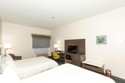Ένα ή περισσότερα κρεβάτια σε δωμάτιο στο Hampton Inn Kerrville