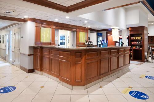a large kitchen with a large island in a room at Hilton Garden Inn Mystic/Groton in Groton